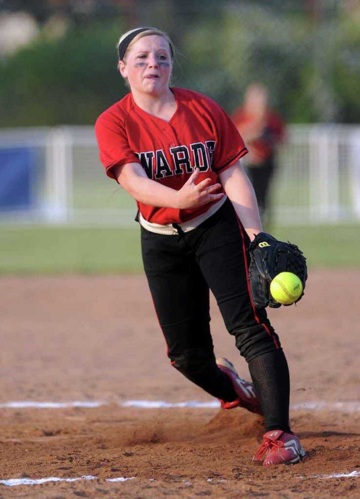 Fairfield Warde's Heather VanDerheyden pitches during Tuesday's class LL semifinal game against Conard at DeLuca Field in Stratford on June 7, 2011.