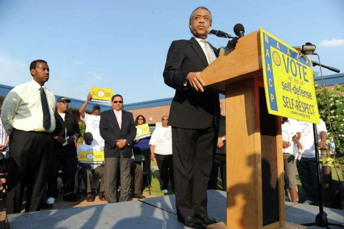 Rev. Al Sharpton takes the stage during the NAACP "Equal Education for All" rally at Brookside Elementary School in Norwalk, Conn., Tuesday, June 7, 2011. The rally was in support of Tanya McDowell, a homeless woman from Bridgeport, Conn., arrested for enrolling her child at Brookside, a Norwalk, Conn., school.