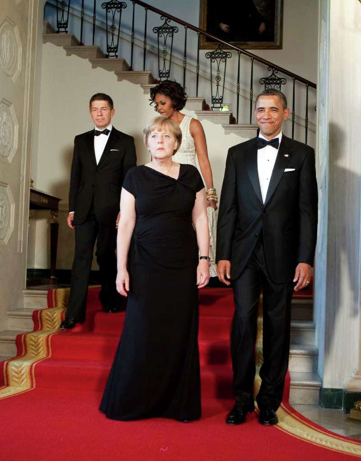 From right, U.S. President Barack Obama, Angela Merkel, chancellor of Germany, First Lady Michelle Obama and Joachim Sauer, Merkel's husband, poses for a portrait at the White House on June 7, 2011 in Washington, DC. This is the first official visit by a European leader to the White House since Obama became president. Merkel will be presented with the 2010 Medal of Freedom at a state dinner tonight.