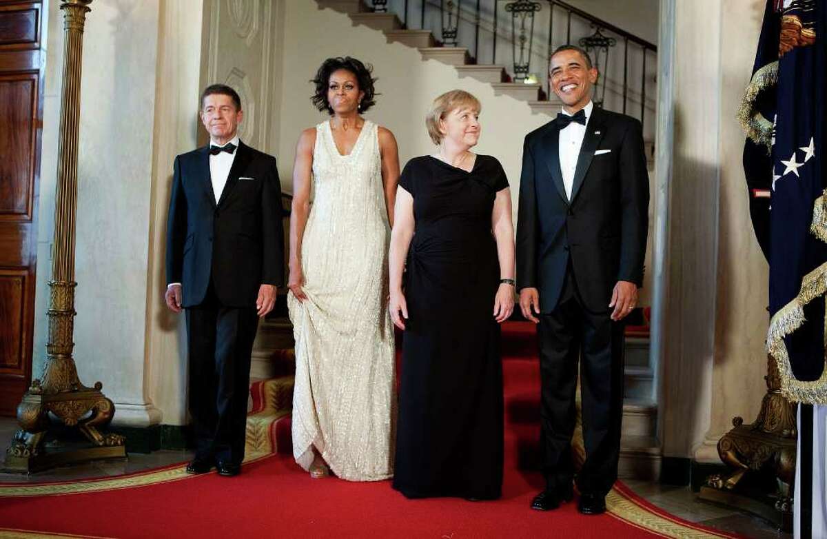 From right, U.S. President Barack Obama, Angela Merkel, chancellor of Germany, First Lady Michelle Obama and Joachim Sauer, Merkel's husband, poses for a portrait at the White House on June 7, 2011 in Washington, DC. This is the first official visit by a European leader to the White House since Obama became president. Merkel will be presented with the 2010 Medal of Freedom at a state dinner tonight.