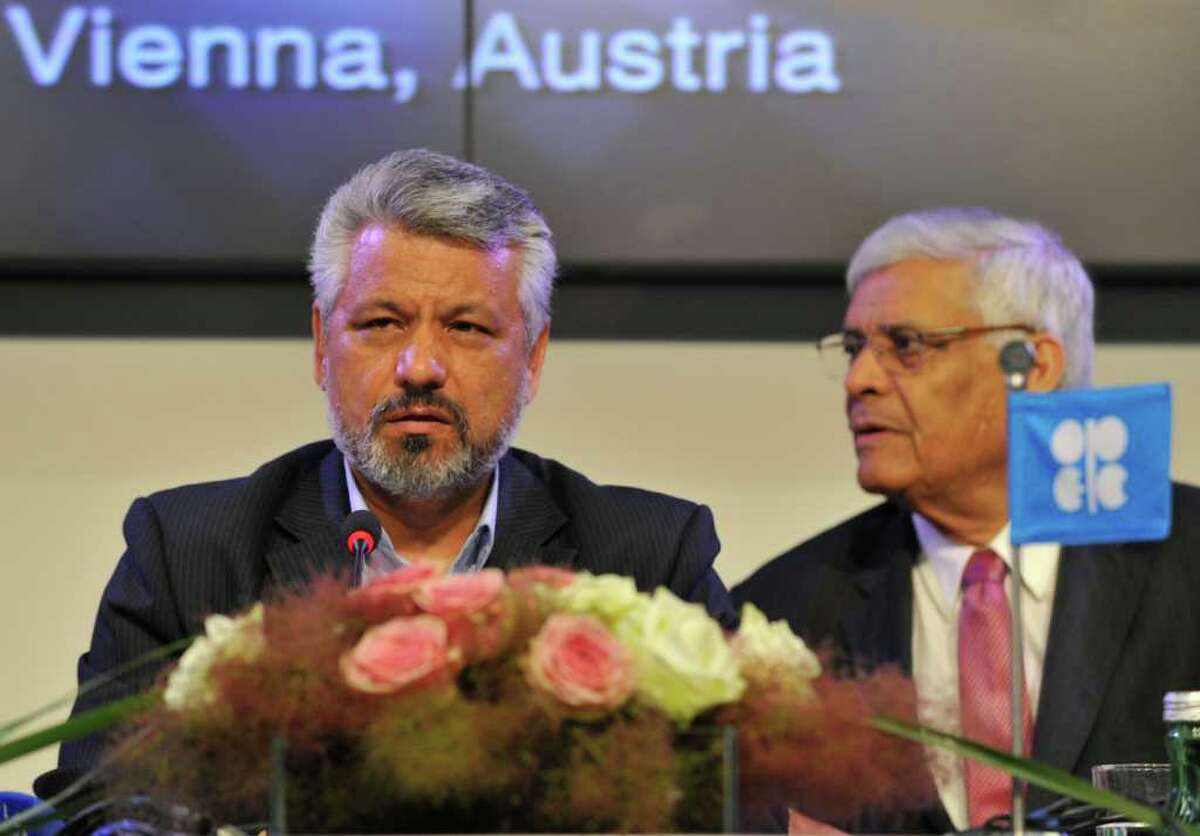 Secretary General of the Organization of the Petroleum Exporting Countries (OPEC) Abdullah Al-Badri, right, and Oil Minister of Iran and OPEC President Mohammad Aliabadi, left, speak during a press conference after the OPEC meeting in Vienna, Austria, Wednesday, June 8, 2011. After ministers were unable to reach consensus to raise crude production, OPEC has decided to maintain output levels, with the option of meeting within the next three months for a possible production hike.