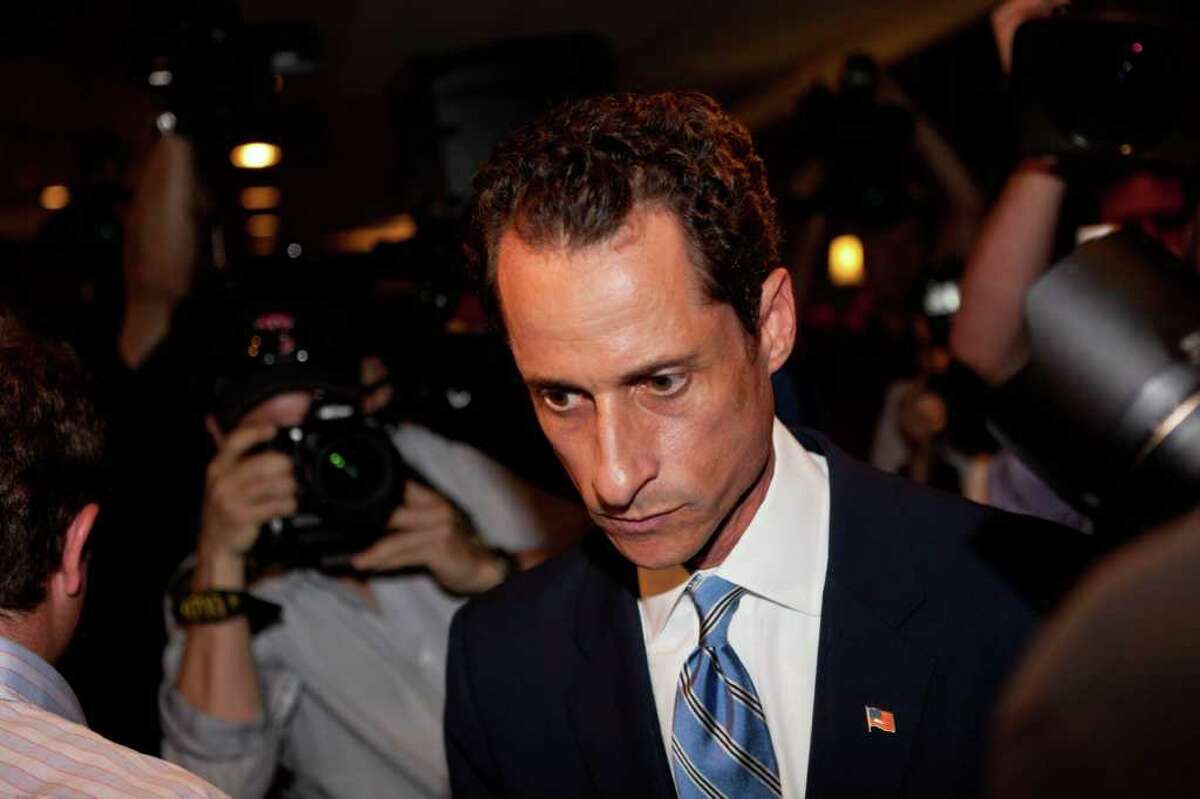 U.S. Rep. Anthony Weiner, D-N.Y., leaves a news conference in New York Monday, June 6, 2011, where he confessed that he tweeted a bulging-underpants photo of himself to a young woman and admitted to "inappropriate" exchanges with six women before and after getting married. (AP Photo/John Minchillo)