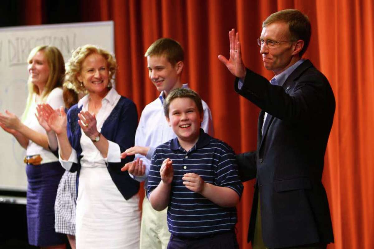 Washington State Attorney General Rob McKenna announces that he plans to run for governor of Washington State along with his family, from left, daughters Madeleine, 23, Katie, 20, wife Marilyn, sons Robert, 15, and Connor, 11, at Sammamish High School on Wednesday, June 8, 2011 in Bellevue. Many had speculated that the popular Republican would run for governor of Washington.