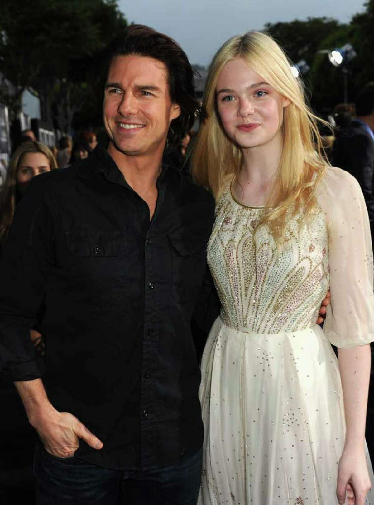 Actors Tom Cruise and Elle Fanning arrive at the premiere of Paramount Pictures' "Super 8" at Regency Village Theatre in Westwood, California.