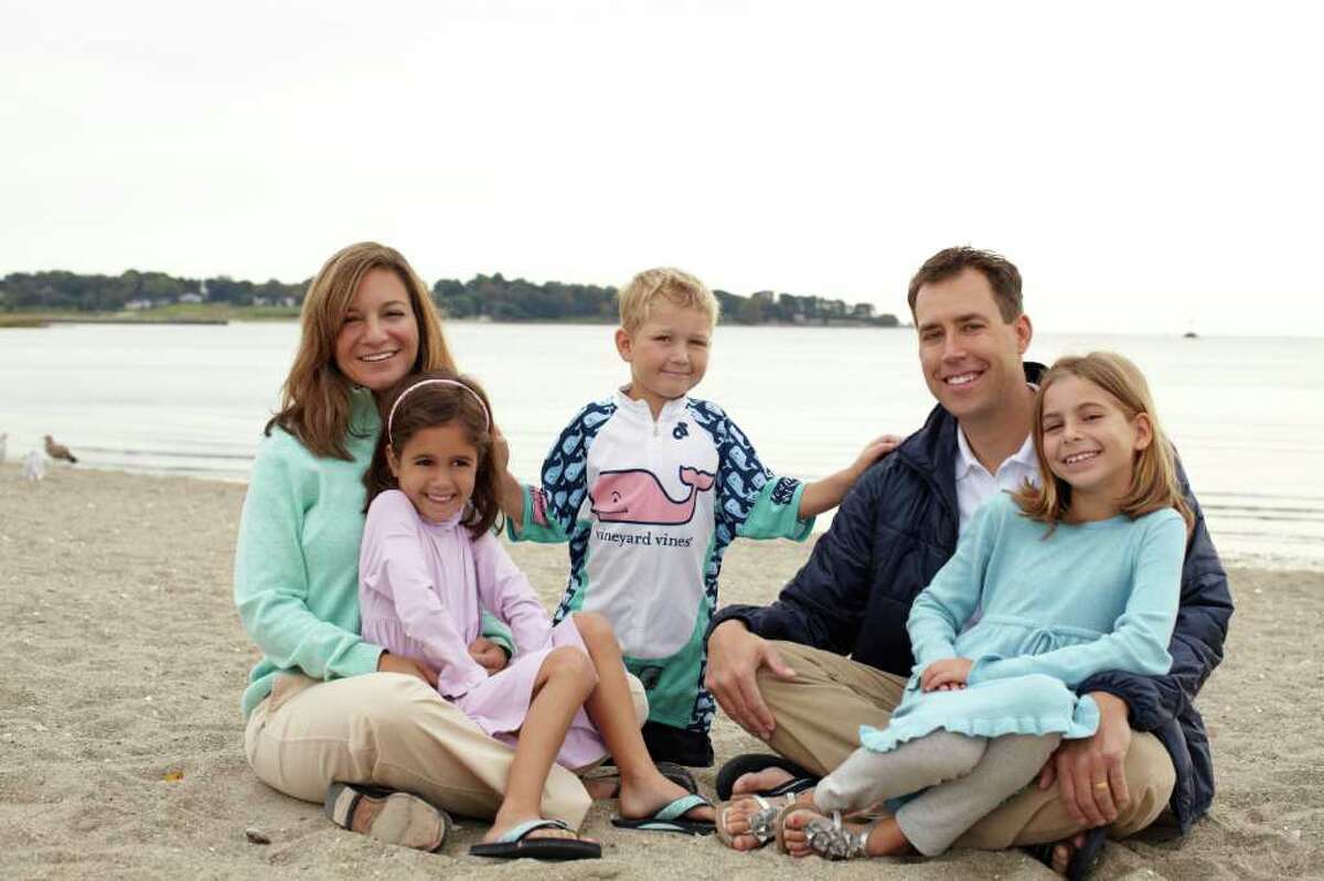 The McCreesh family at Southport Beach. From left: Dana, with Kira, 6; Brent, 9; and Michael, with Madison, 10.
