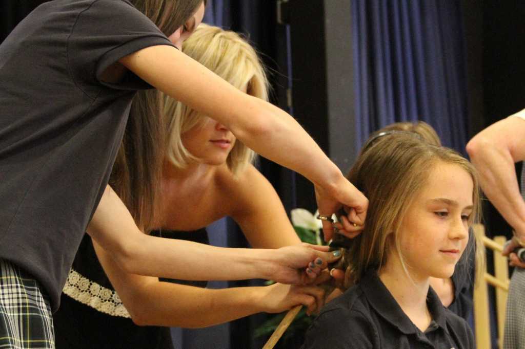 st-thomas-aquinas-students-donate-hair-to-locks-of-love