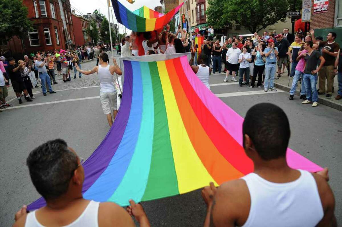 A float from the Albany Damien Center marches on Lark Street during the Capital Pride 2011 Parade & Festival on Sunday, June 12, 2011, in Albany, NY. ( Philip Kamrass / Times Union)
