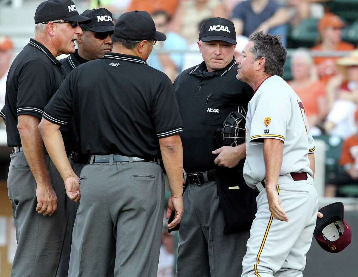 Arizona State coach Tim Esmay argues the call which brought his runner back from third in the early innings as the Texas Longhorns play Arizona State in game 3 of their super regional playoff series at Disch-Falk Field in Austin on June 12, 2011. Tom Reel/Staff