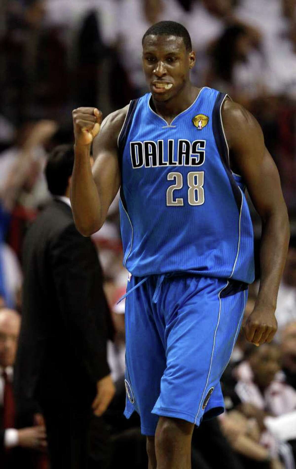 Dallas Mavericks' Ian Mahinmi reacts during the second half of Game 6 of the NBA Finals basketball game against the Miami Heat Sunday, June 12, 2011, in Miami.