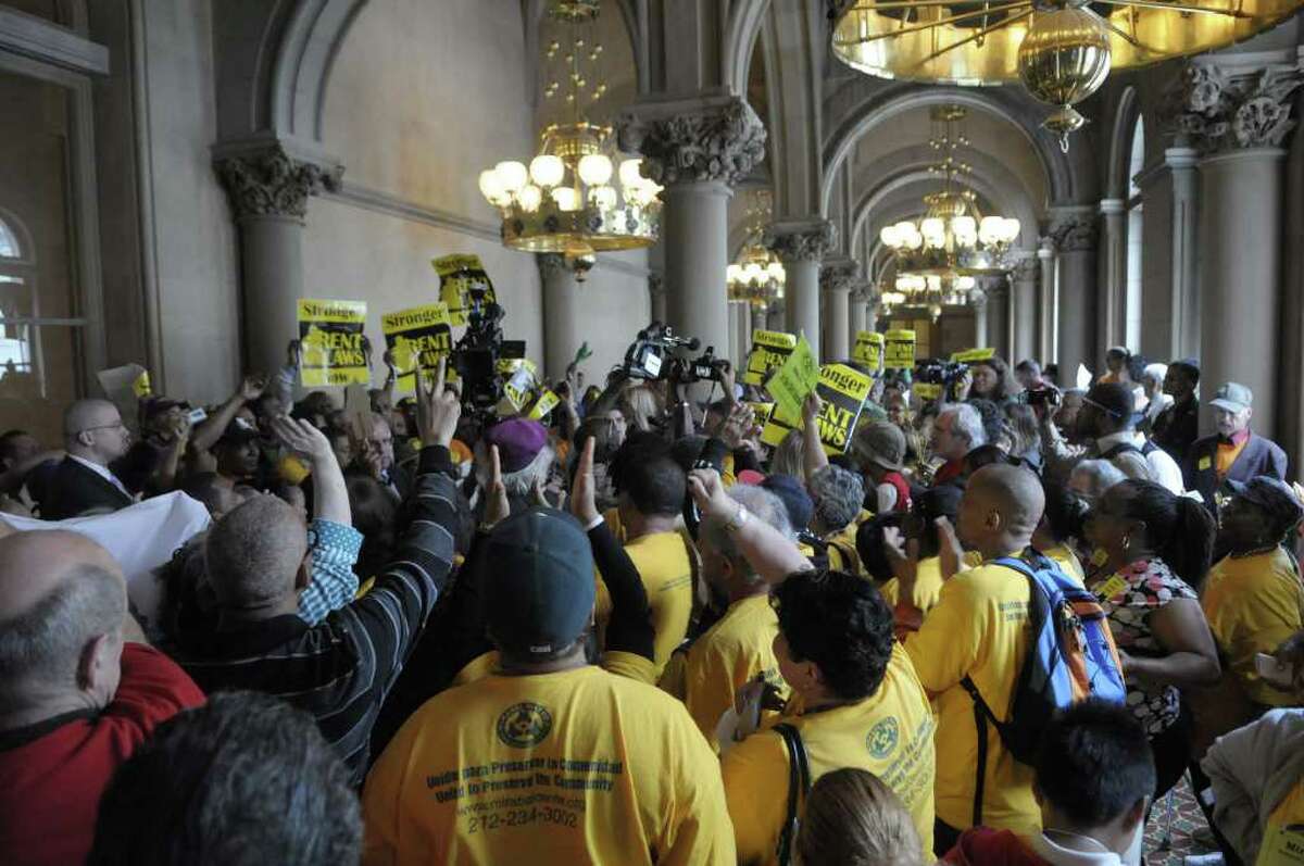 New York City tenants and tenant advocates hold a rally inside the capitol on Monday afternoon, June 13, 2011 in Albany. The group was calling on lawmakers to pass a bill with stronger rent laws and not just extend the existing rent control law. (Paul Buckowski / Times Union)