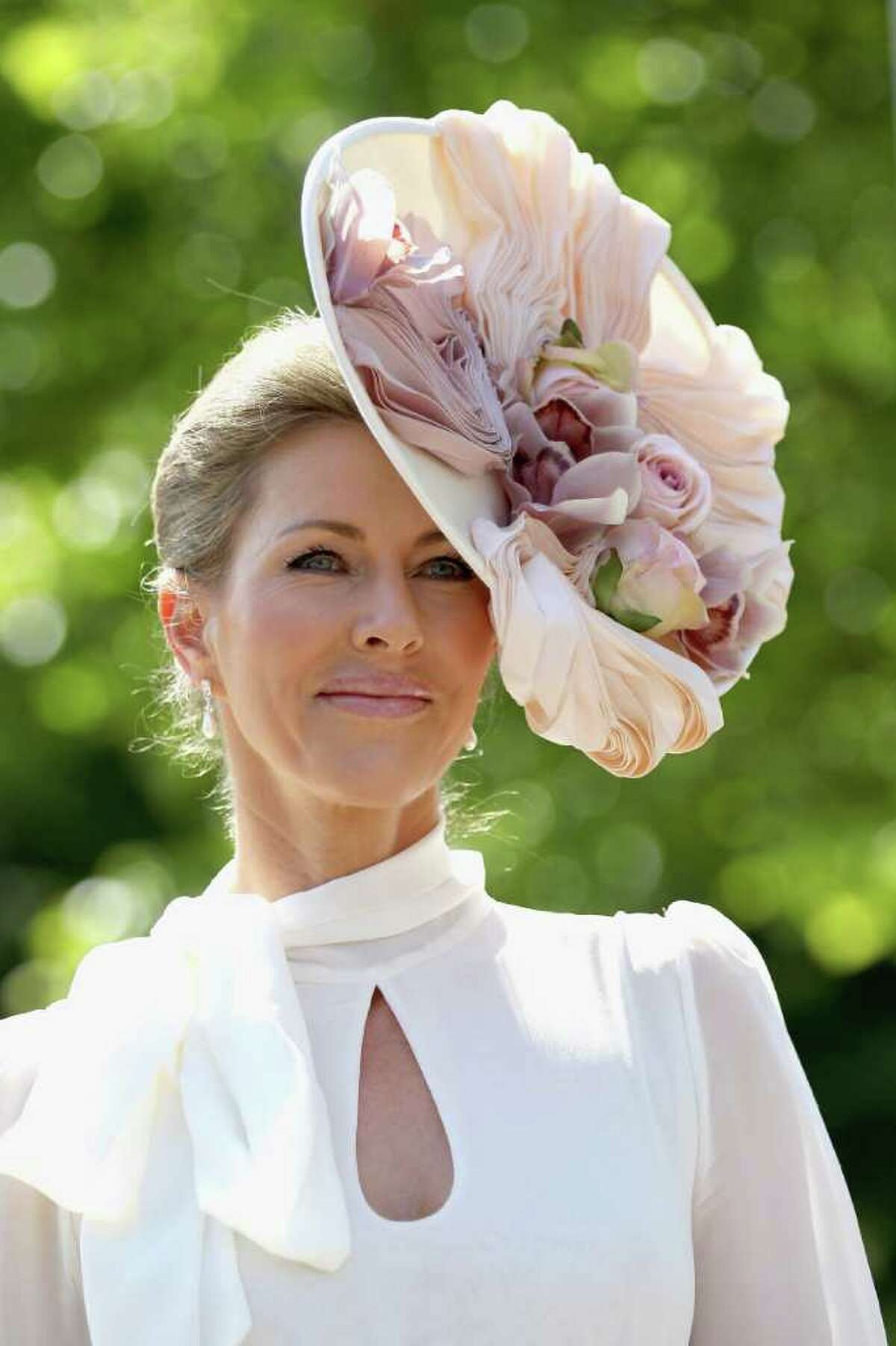 ASCOT, ENGLAND - JUNE 14: Belinda Stradwick poses for a photograph as she arrives for the opening day of Royal Ascot at Ascot Racecourse on June 14, 2011 in Ascot, United Kingdom. (Photo by Chris Jackson/Getty Images)