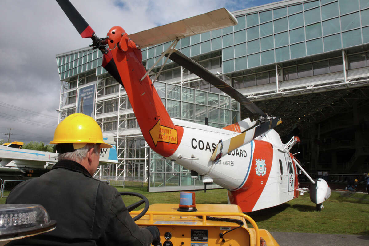 The Museum of Flight installs its former Coast Guard Sikorsky HH-52 Seaguard amphibious helicopter in its Great Hall on Monday, June 13, 2011.
