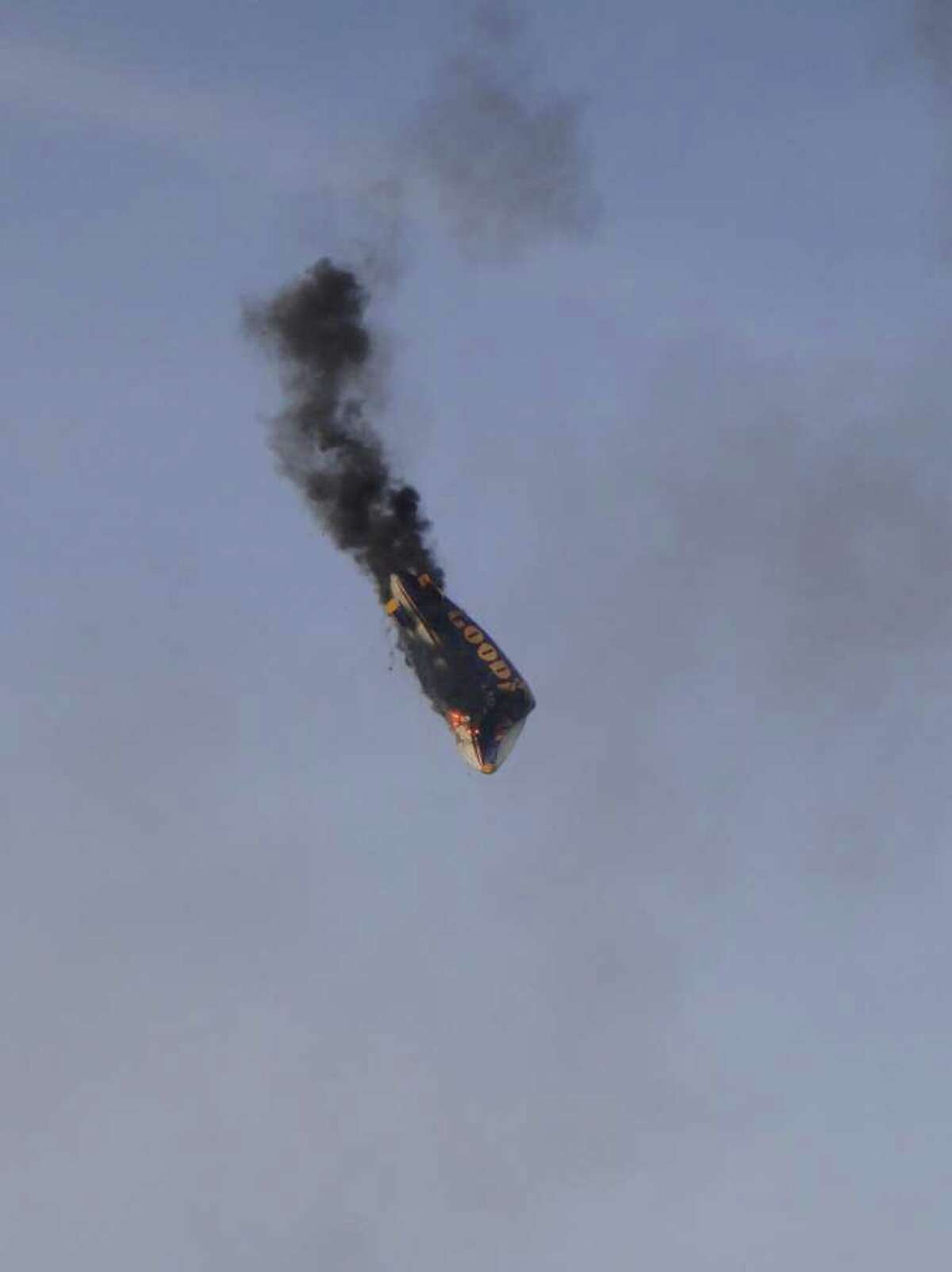  A Goodyear blimp crashes near Oberursel, western Germany, on Sunday. The pilot of the blimp was killed and three passengers had to leap to safety when the aircraft caught fire and crashed, a police spokesman said. The blimp had been making a promotional flight to mark a local festival.
