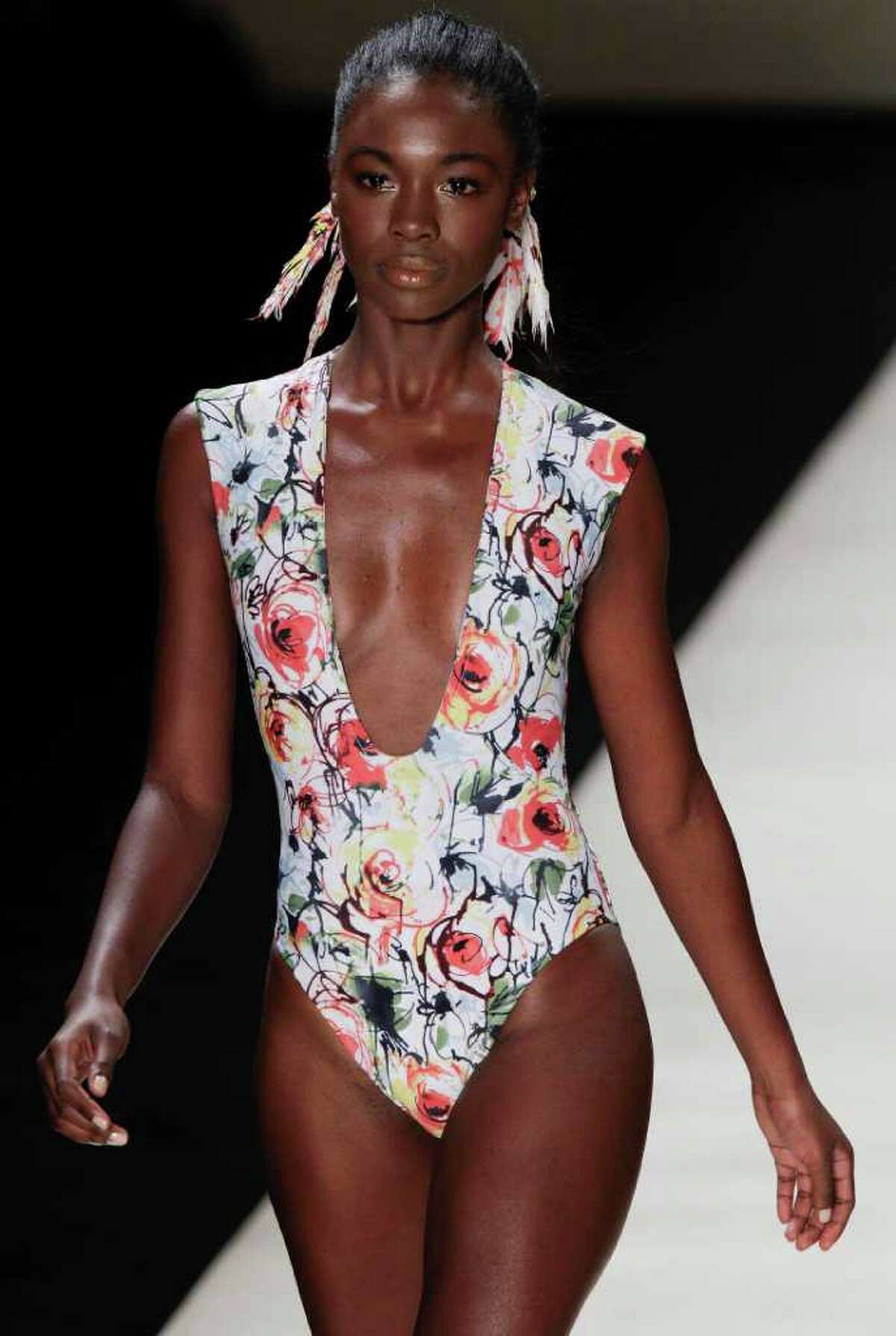 A model wears a creation by Movimento during the Sao Paulo Fashion Week Summer 2012 collection in Sao Paulo, Brazil, Tuesday June 14, 2011.