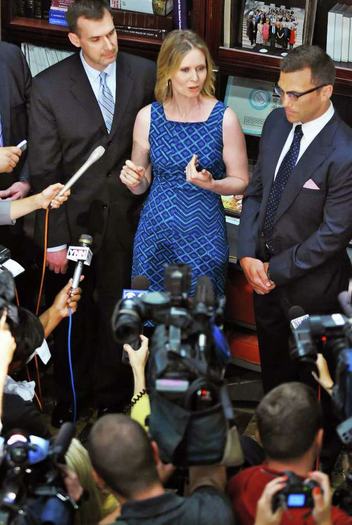 Gay rights activist Ross Levi, left, ?Sex and The City? star Cynthia Nixon and New York Rangers player Sean Avery, at right, during a news conference calling on the state legislature to legalize same-sex marriage at the Capitol Tuesday June 14, 2011. (John Carl D'Annibale / Times Union)