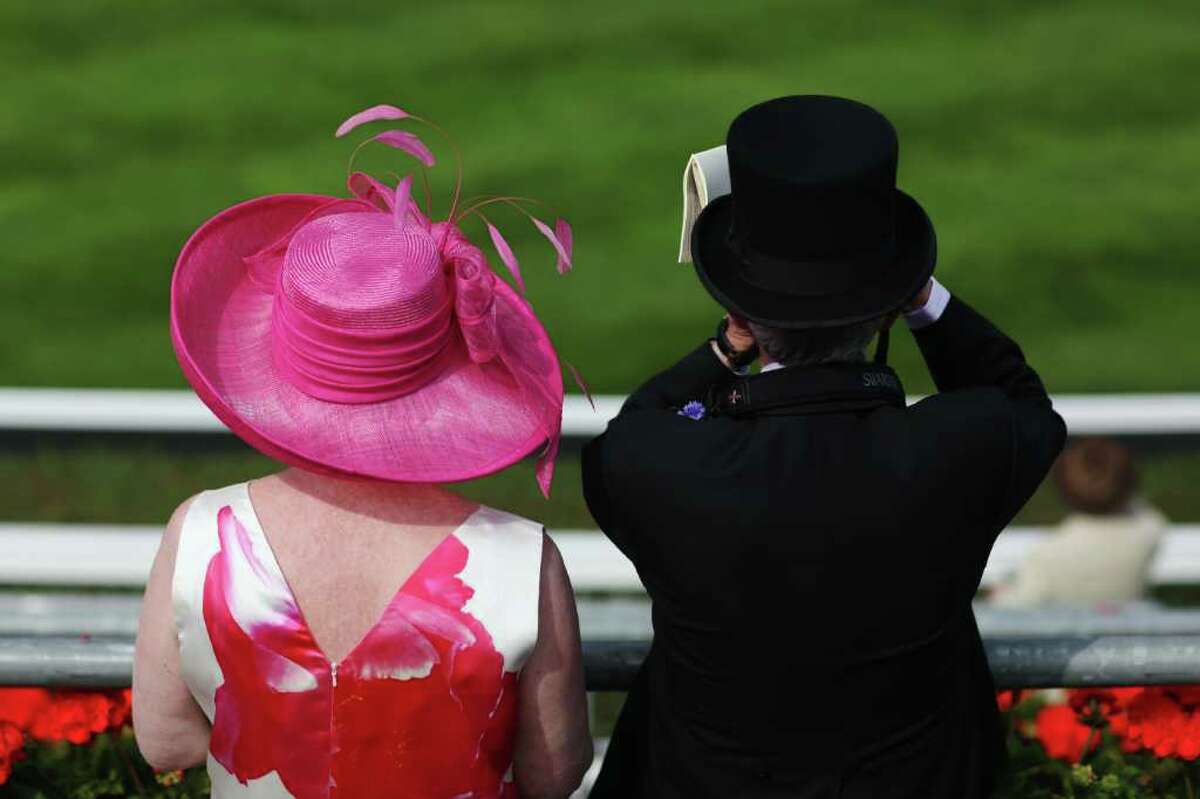  Race gather in the Royal enclosure on day one at Royal Ascot on Tuesday in Ascot, England. The five-day meeting is one of the highlights of the horse racing calendar, with 2011 marking the 300th anniversary of the annual event. Horse racing has been held at the famous Berkshire course since 1711.