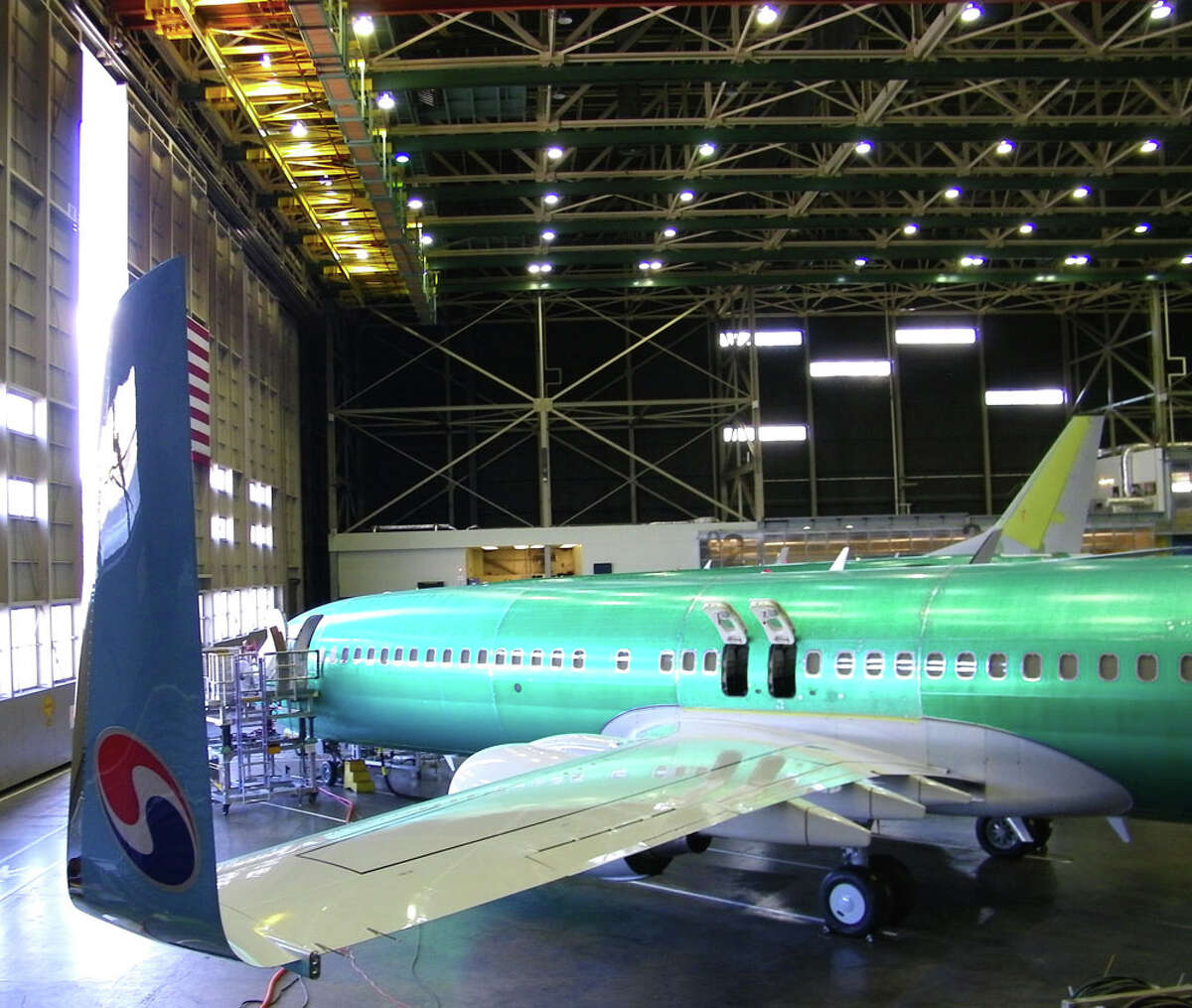 Boeing workers assemble a 737 for Korean Air on Friday, June 3, 2011 in Boeing's 737 plant in Renton, Wash.
