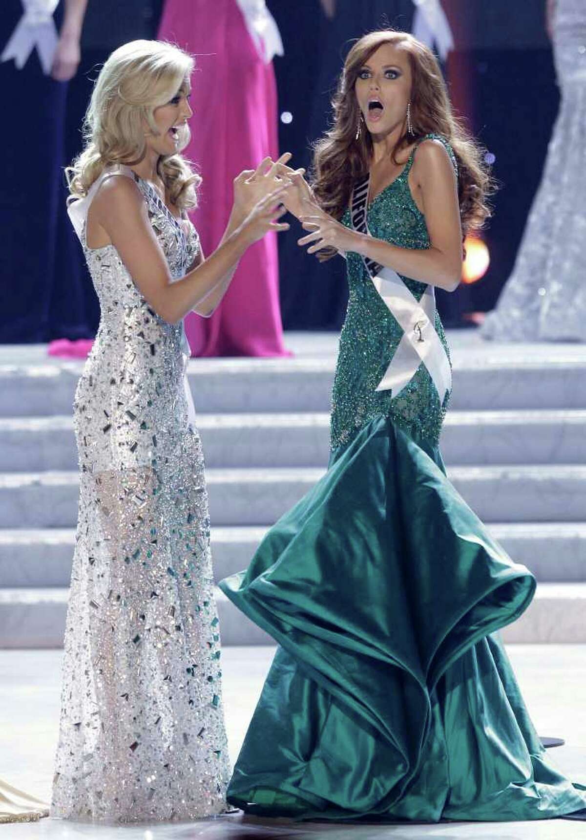 Alyssa Campanella, Miss California, reacts as she is announced as the 2011 Miss USA as Miss Tennessee, Ashley Elizabeth Durham looks on, Sunday, June 19, 2011, in Las Vegas.