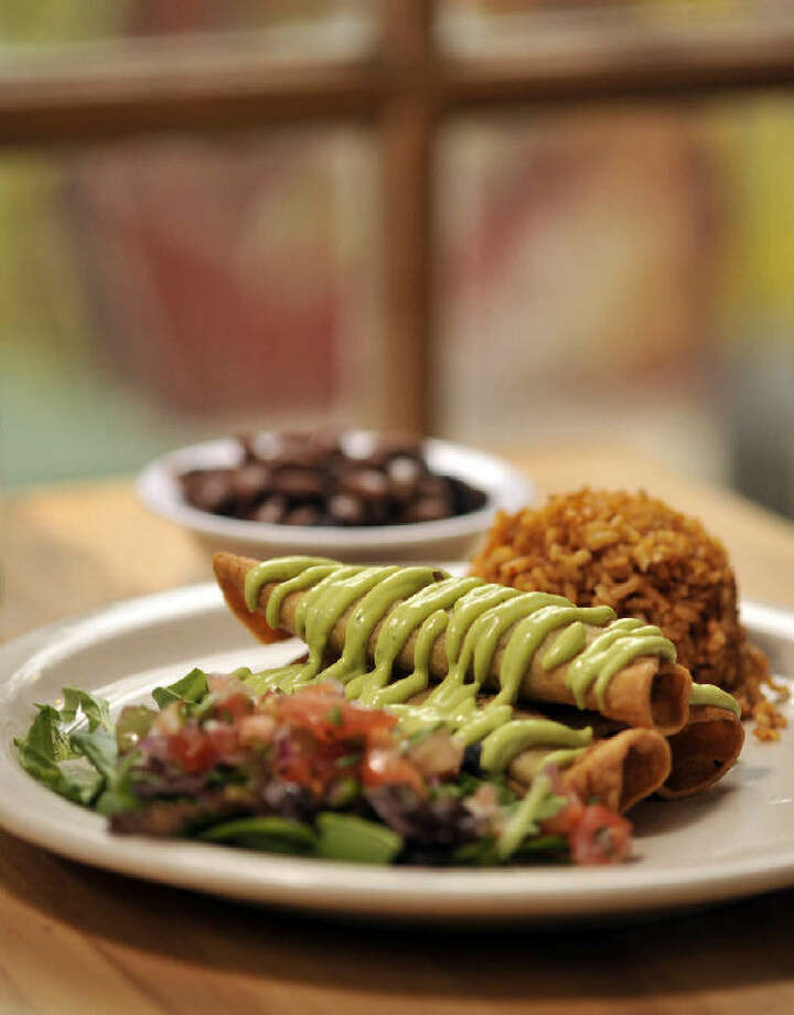 Readers Choice Best Healthy Light Vegetarian Restaurant Green The Flauta Plate Is Served With Spanish Rice At Green Vegetarian Cuisine Photo Robin