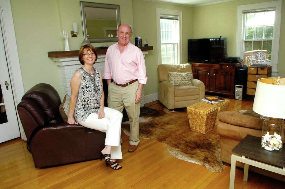 House staging partners Birgit Anich and Gary Sefferman in a room they staged in Anich's Norwalk, Conn. home on Monday June 20, 2011.