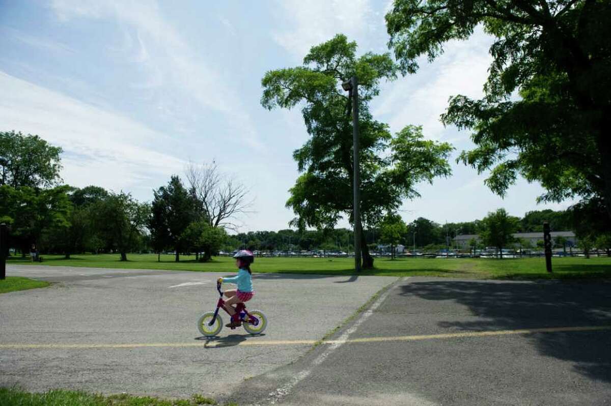 Julia Coggins, 4, rides her bike through Cove Island Park in Stamford, Conn., June 20, 2011.