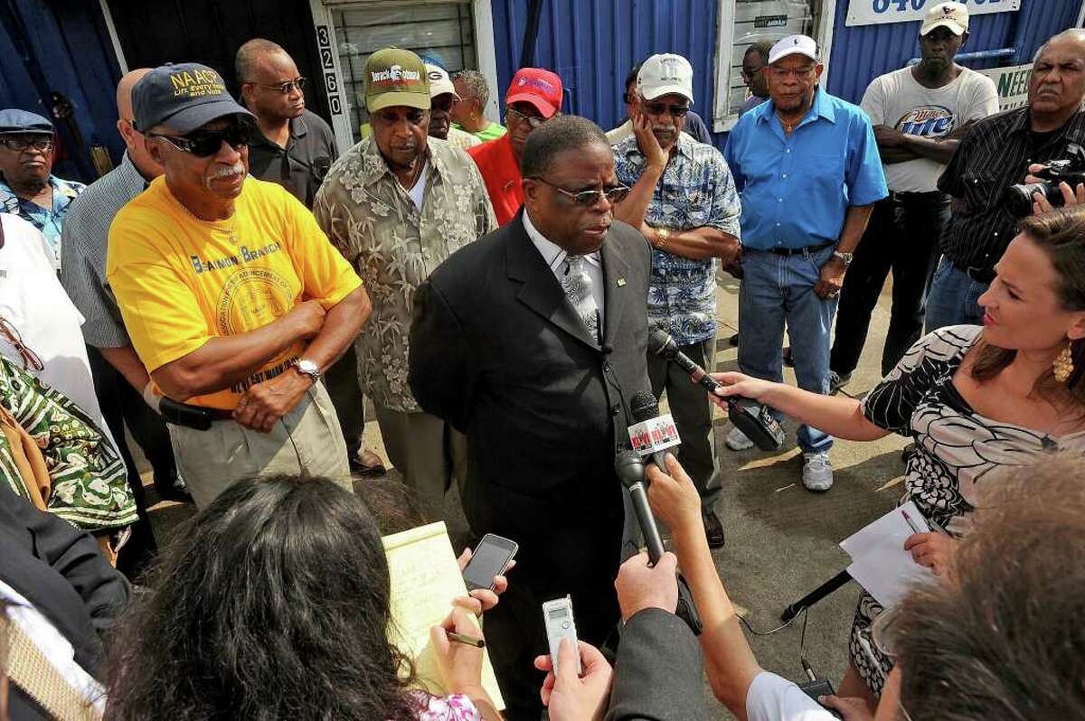 R.L. Bishop, the president of the Beaumont branch of the NAACP speaks at a press conference Tuesday, claiming the media is biased in its coverage of the black community. Guiseppe Barranco/The Enterprise