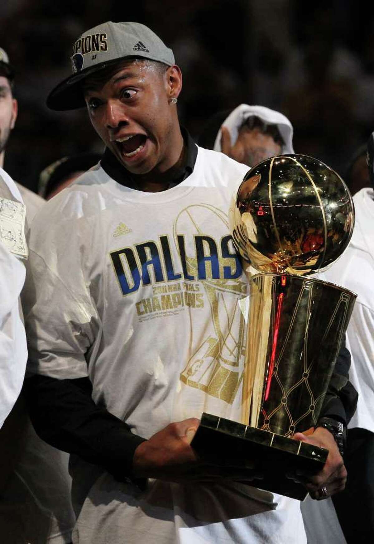 Despite missing the series due to a season-ending knee injury in January, Caron Butler earned his first NBA championship ring with the Dallas Mavericks. Above, he celebrates with the Larry O'Brien trophy after the Mavericks won 105-95 against the Miami Heat in Game Six of the 2011 NBA Finals at American Airlines Arena on June 12, 2011 in Miami, Florida. (Photo by Ronald Martinez/Getty Images)