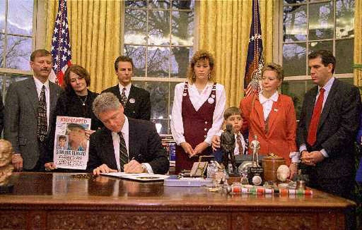 When Adam Croote was 7 in 1996, he and his paternal grandmother Linda Koerner were invited to the White House as President Clinton signed a memorandum requiring missing children posters be hung in all federal buildings. The boy's photo was taken with Clinton and other families involved in missing persons cases. (Associated Press archives)