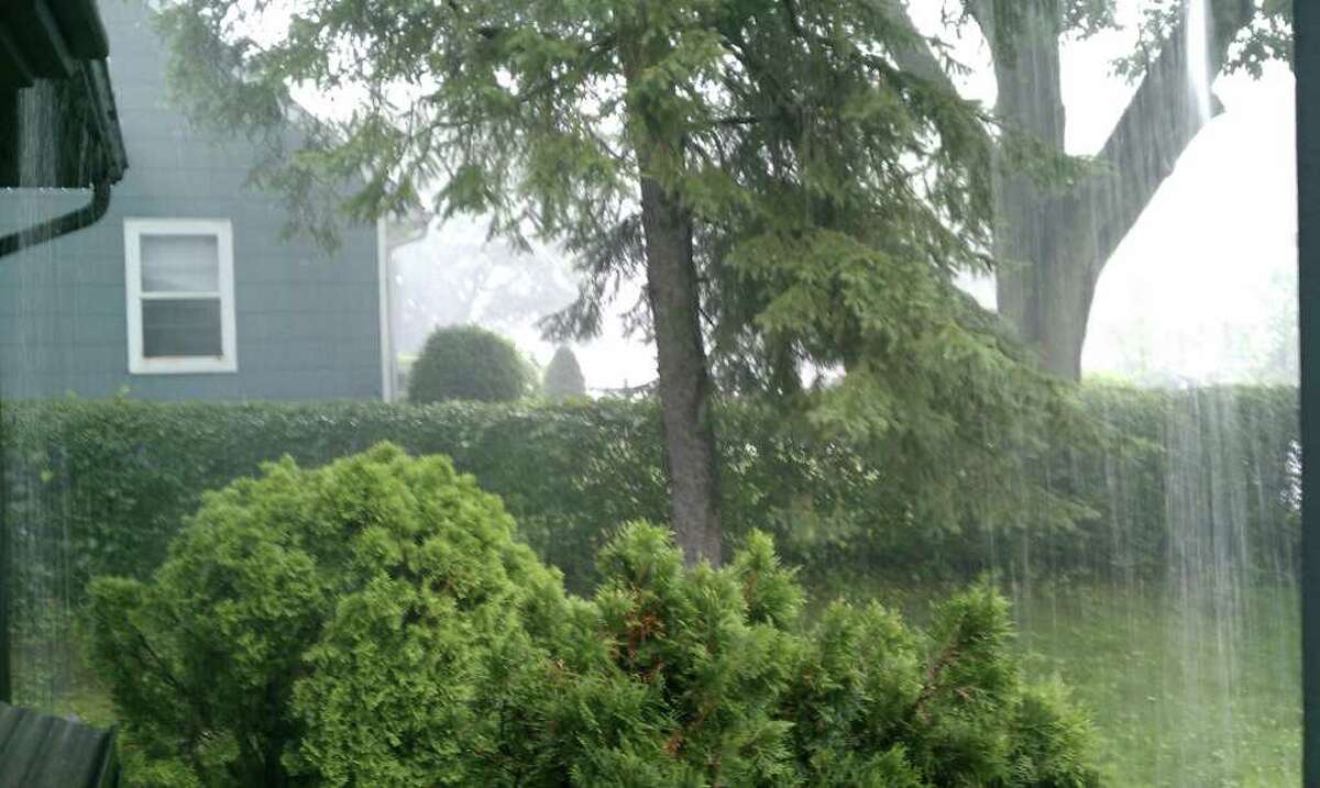 Heavy rain falls in Norwalk, Conn. on Thursday, June 23, 2011.