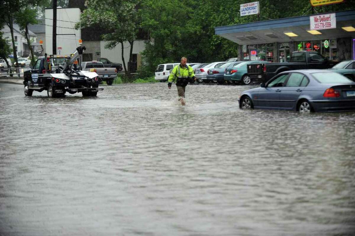 Heavy rain triggers flood alert for Westport, region