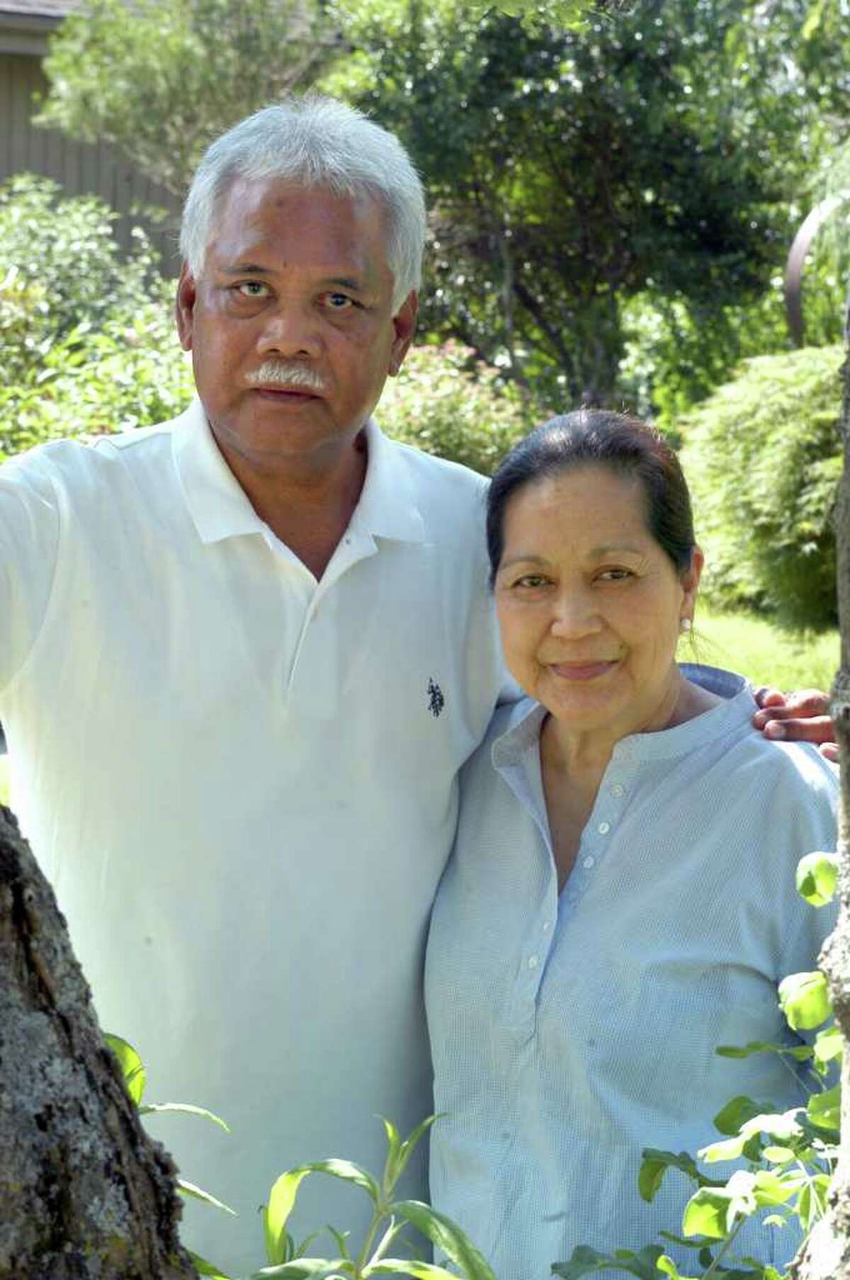 Efren and Anita Rebong's oldest son, Mark, was murdered while driving to work from Newtown on Interstate 84 in 2000. The case remains unsolved.