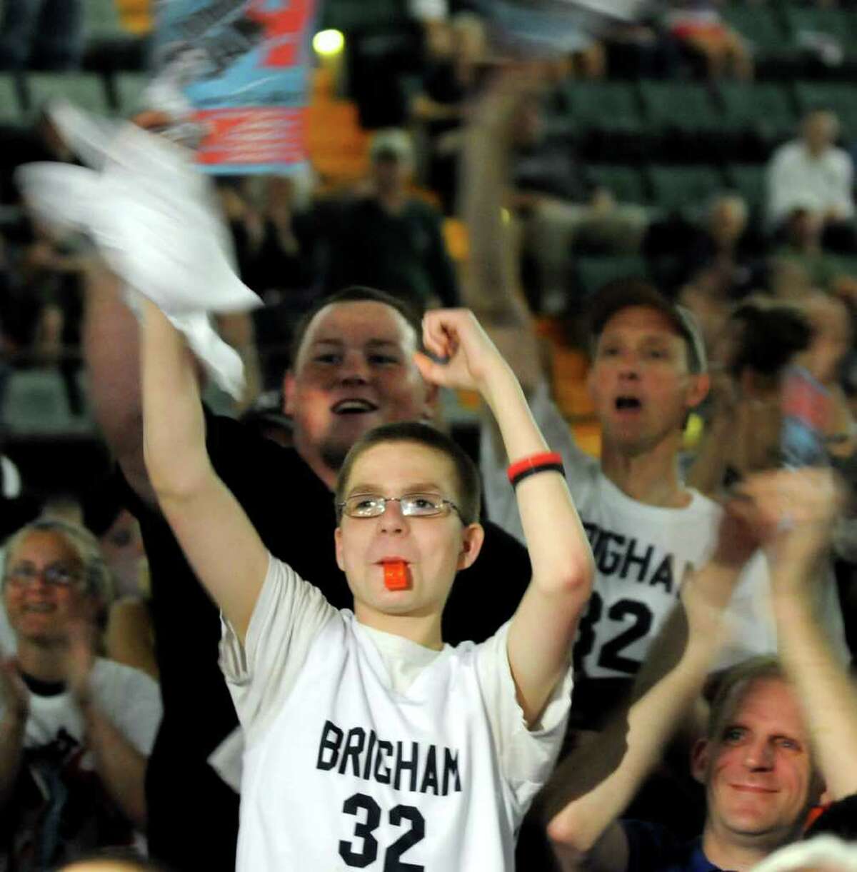 Patrick Oleksiak, 14, of Scotia, center, cheers as Milwaukee selects Jimmer Fredette during the NBA draft on Thursday, June 23, 2011, at the Glens Falls Civic Center in Glens Falls, N.Y. (Cindy Schultz / Times Union)