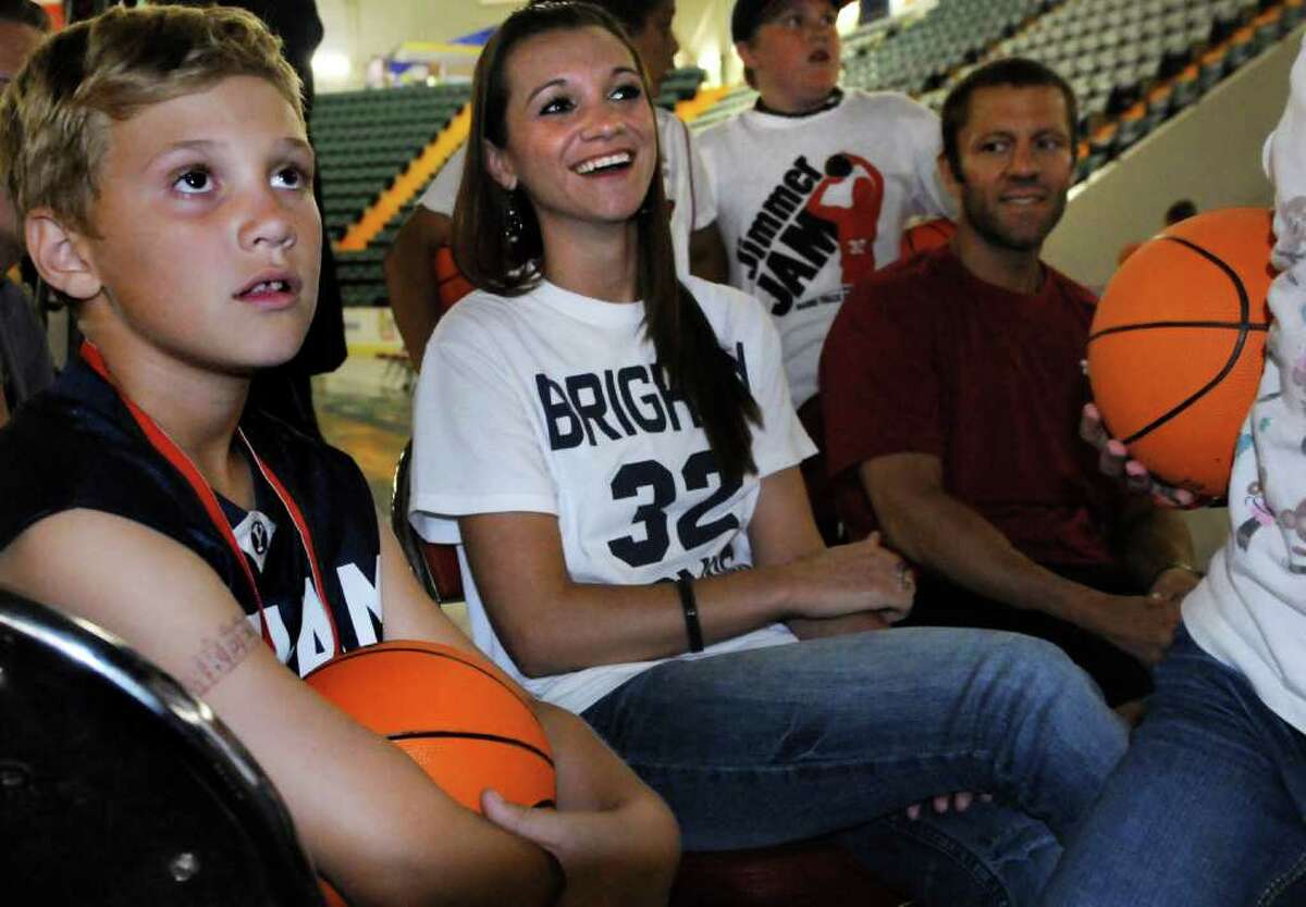 Jimmer Fredette fans Noah Girard 8, of Glens Falls, left, his mother Stacey, center, and on Thursday, June 23, 2011, at the Glens Falls Civic Center in Glens Falls, N.Y. (Cindy Schultz / Times Union)