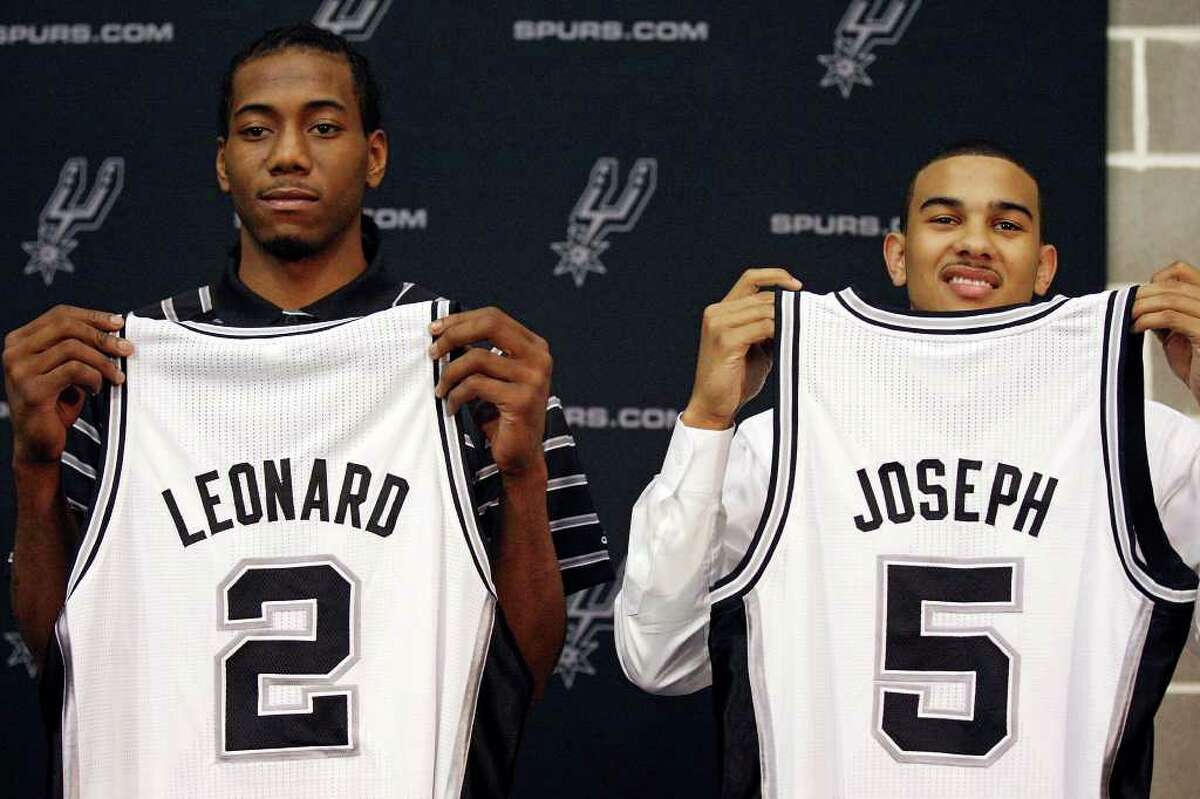 2. Leonard introduced to San Antonio June 2011 Photo: The Spurs introduce players Kawhi Leonard (left) and Cory Joseph during a press conference Saturday June 25, 2011 at the Spurs practice facility.