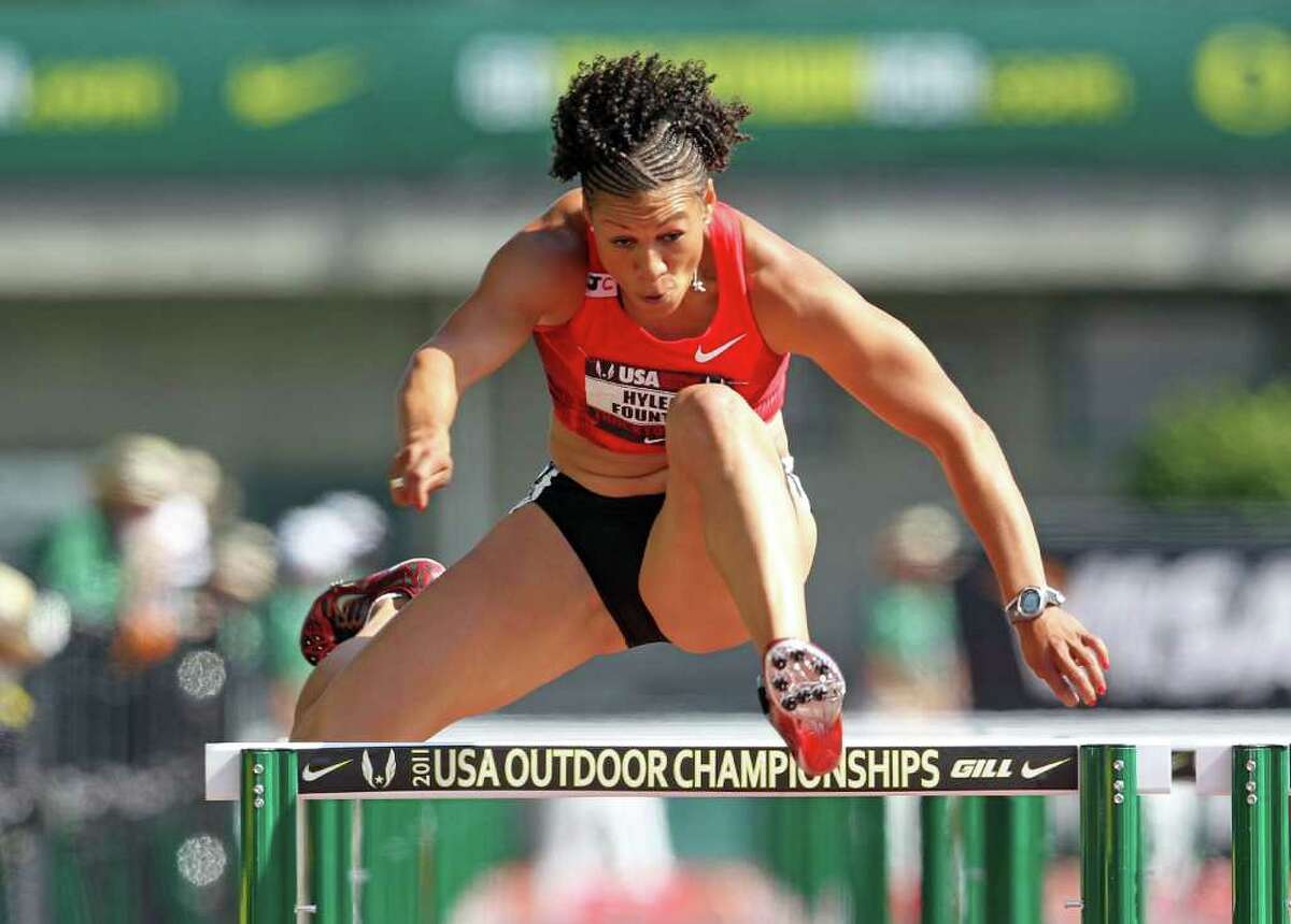 Hyleas Fountain clears a hurdle in the 100 meter hurdles in the heptathlon during the 2011 USA Outdoor Track & Field Championships at Hayward Field in Eugene, Ore., on Saturday, June 25, 2011.
