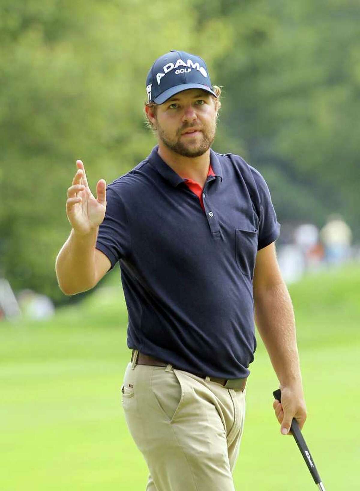 CROMWELL, CT - JUNE 26: Ryan Moore reacts during the final round of the Travelers Championship at TPC River Highlands on June 26, 2011 in Cromwell, Connecticut. (Photo by Jim Rogash/Getty Images)