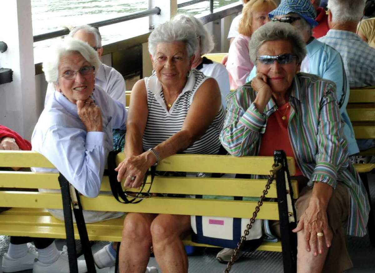 From left, Bernice Carroll, Dolly Sarica and Anna Ferraro, all from Greenwich listening to the Hedge Fund Ruscals' Dixieland jazz band on Island Beach ferry on Sunday, June 26, 2011.