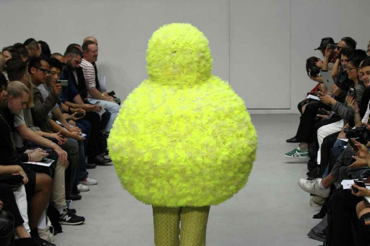 A model displays a creation by Belgian fashion designer Walter Van Beirendonck during his men's spring-summer 2012 fashion collection show on June 24, 2011 in Paris.