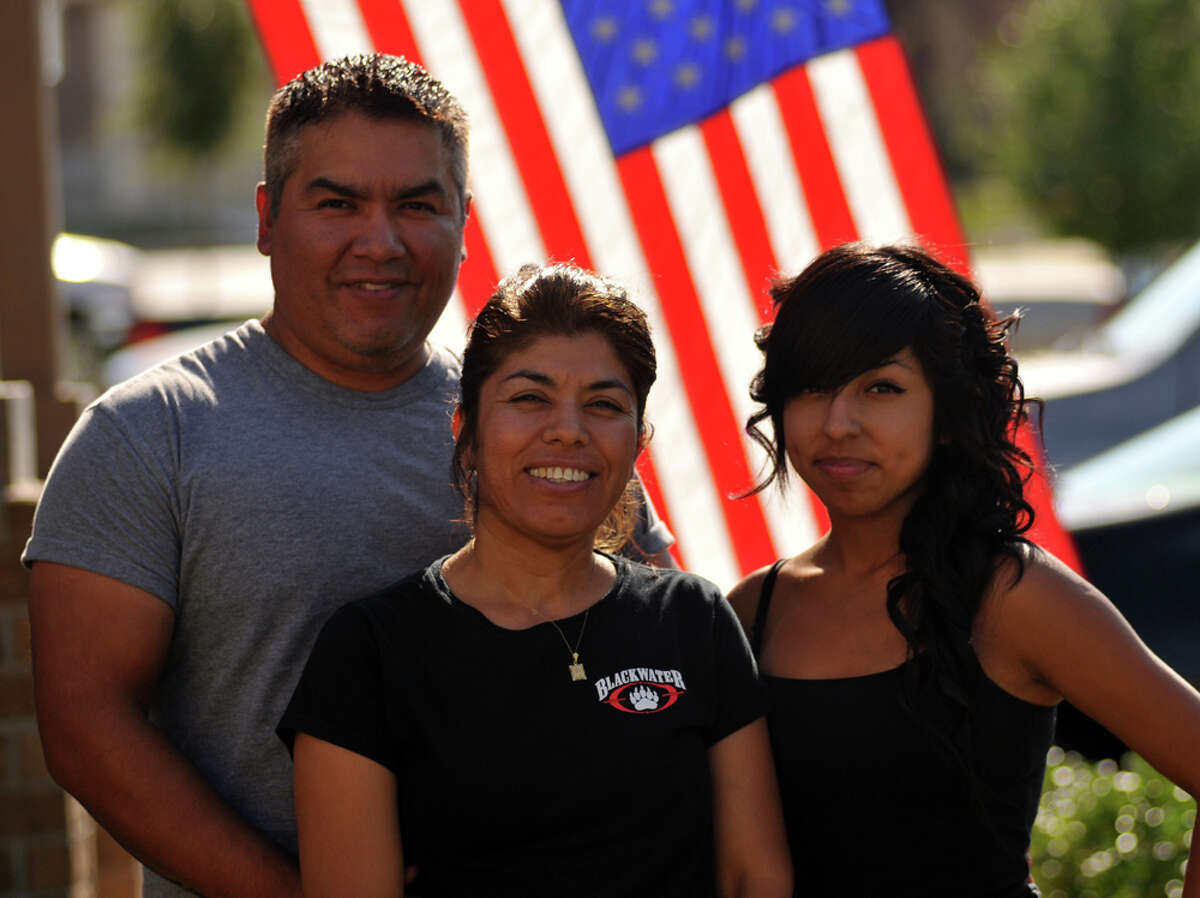 George Nolasco, with his wife, Hortencia and daughter, Yuliana, has gone through a process to get Hortencia, who entered the country illegally, legal residency through a process available to active-duty military members.