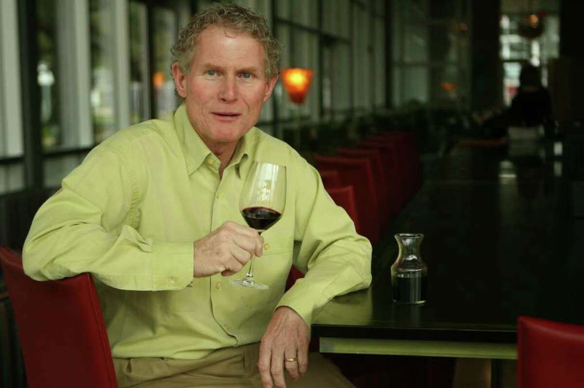 New wine columnist Dale Robertson at Grove restaurant enjoying a favorite bottle of wine on Tuesday, March. 4, 2008 in Houston, TX. Photo by Mayra Beltran / Chronicle