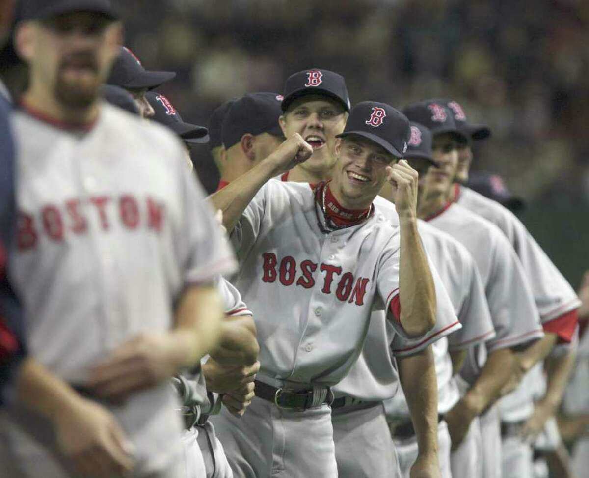 Pitcher Clay Buchholz reacts as Boston Red Sox players line up before their Major League Baseball regular season opener against the Oakland Athletics at Tokyo Dome in Tokyo, Tuesday, March 25, 2008. (AP Photo/David Guttenfelder)
