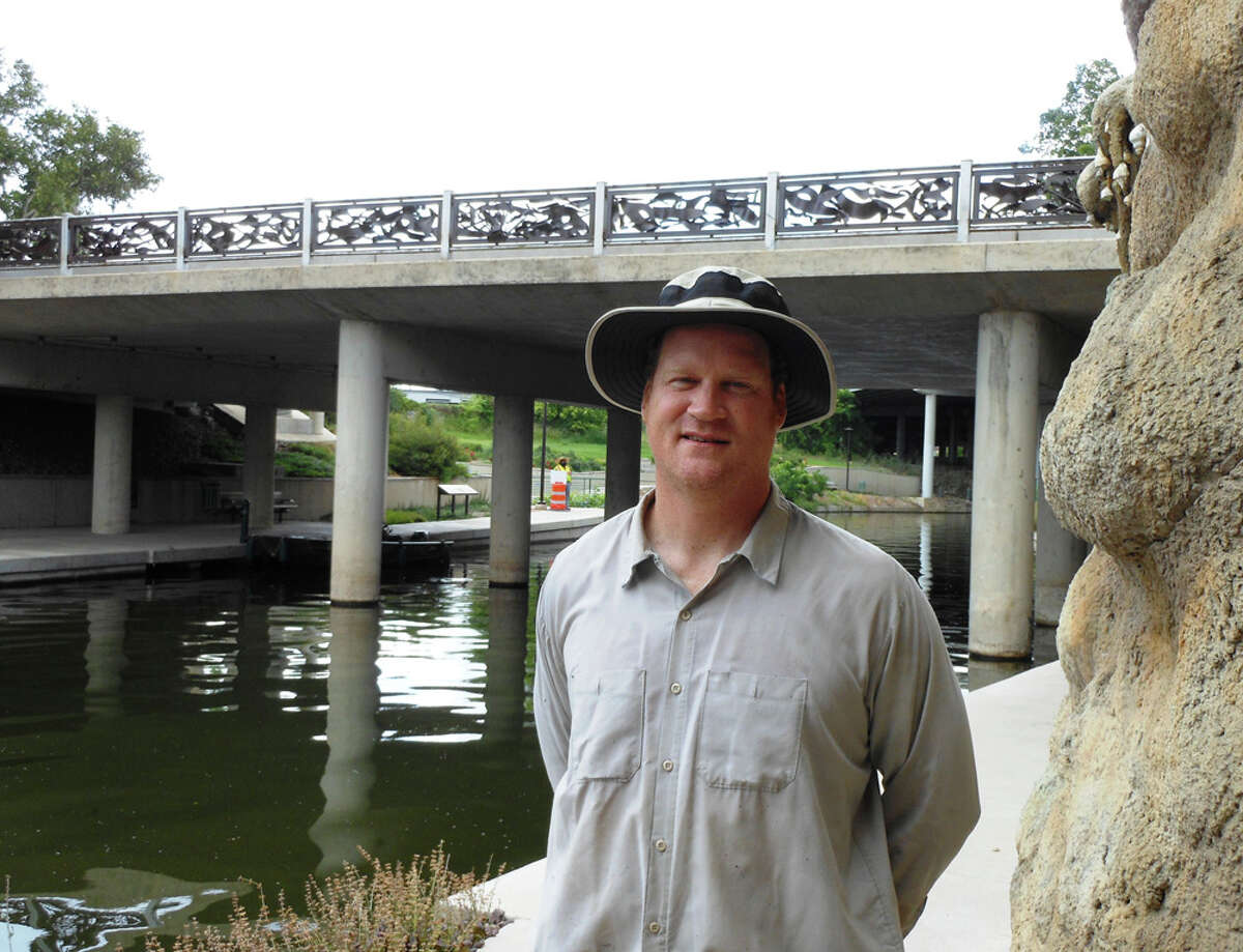 San Antonio artist George Schroeder says his "River Movement" on the Camden Street bridge is "the largest forged steel project I've ever done." STEVE BENNETT / EXPRESS-NEWS
