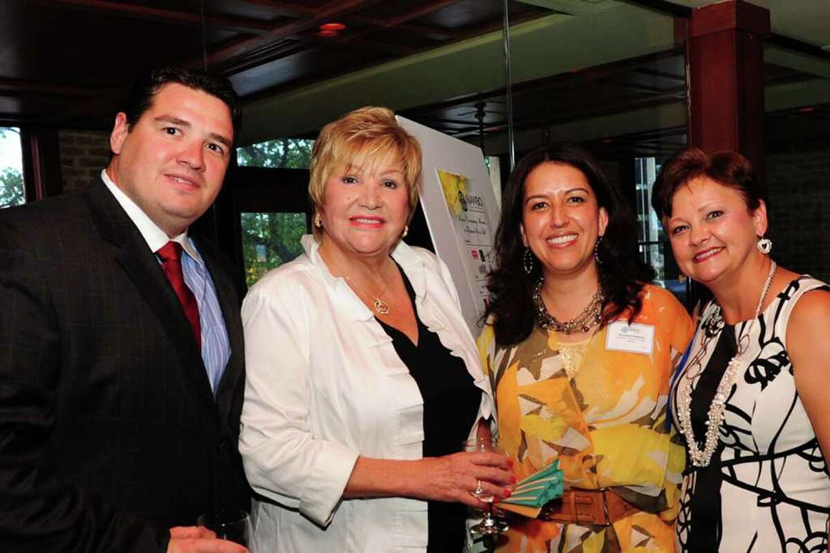 David Duke (from left) and his mother, Lana Duke, co-owners of Ruth's Chris Steak House at Sunset Station, are joined by Veronica Esparza and Patsy Foxworth at a dinner for the San Antonio chapter of NAWBO.