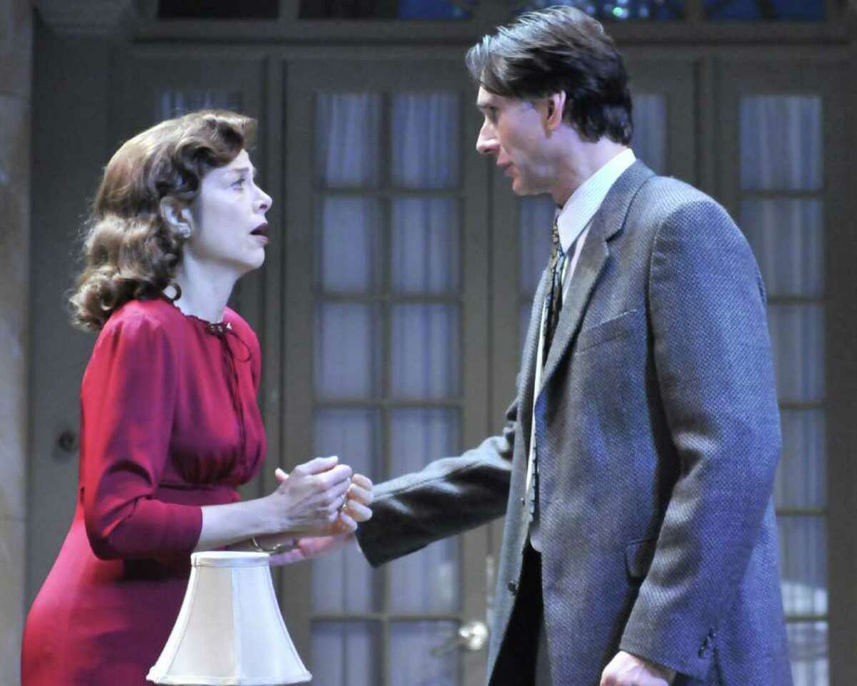 L-R) Josie de Guzman as Vera Claythorne and Todd Waite as Philip Lombard in the Alley Theatre s production of Agatha Christie s And Then There Were None. Agatha Christie s And Then There Were None runs on the Alley Theatre s Hubbard Stage June 29 through July 31, 2011. For more information visit www.alleytheatre.org. Photo by Jann Whaley.