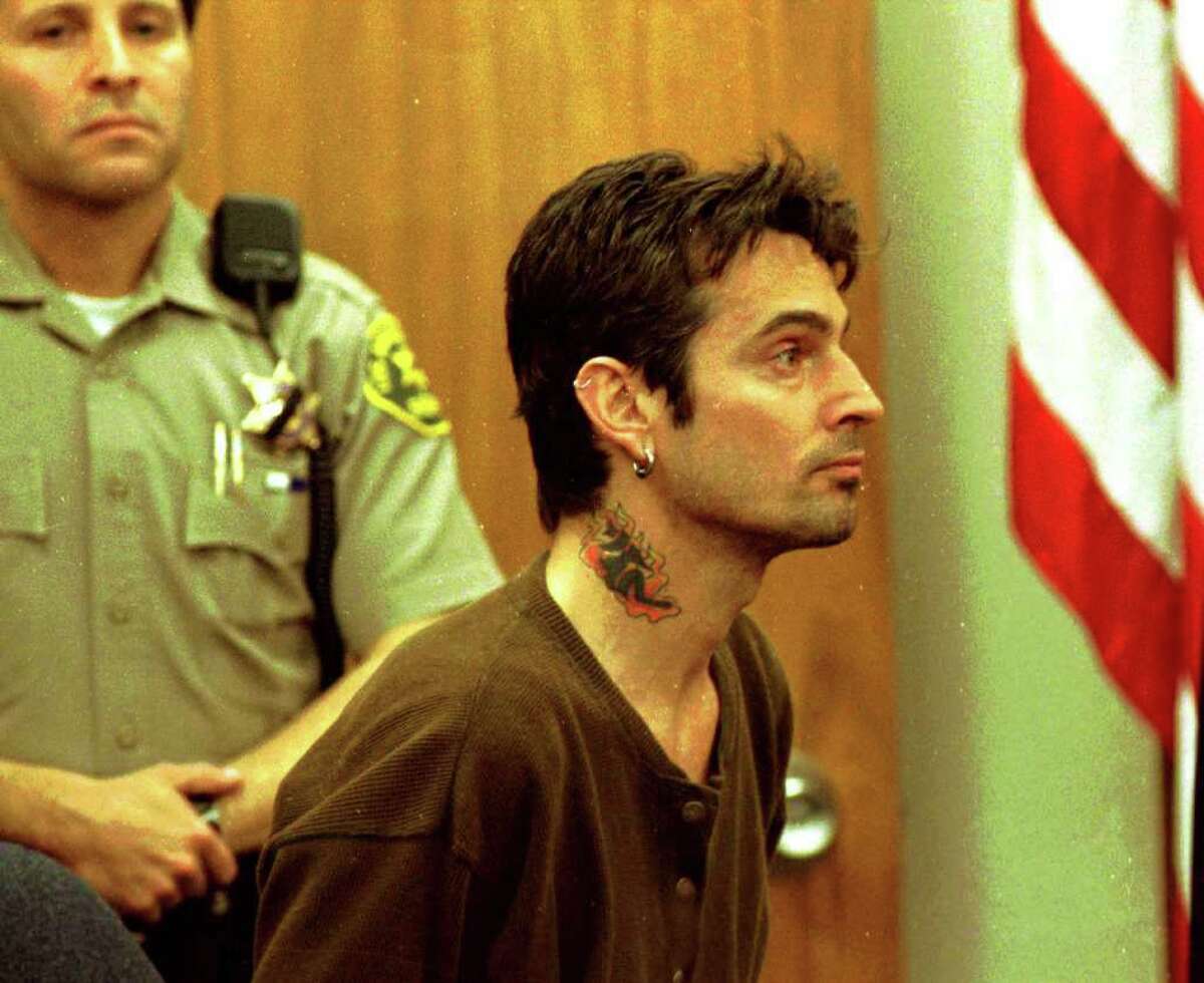 Here Tommy Lee Appears At Malibu Municipal Court accused Of attacking Pamela in 1996.