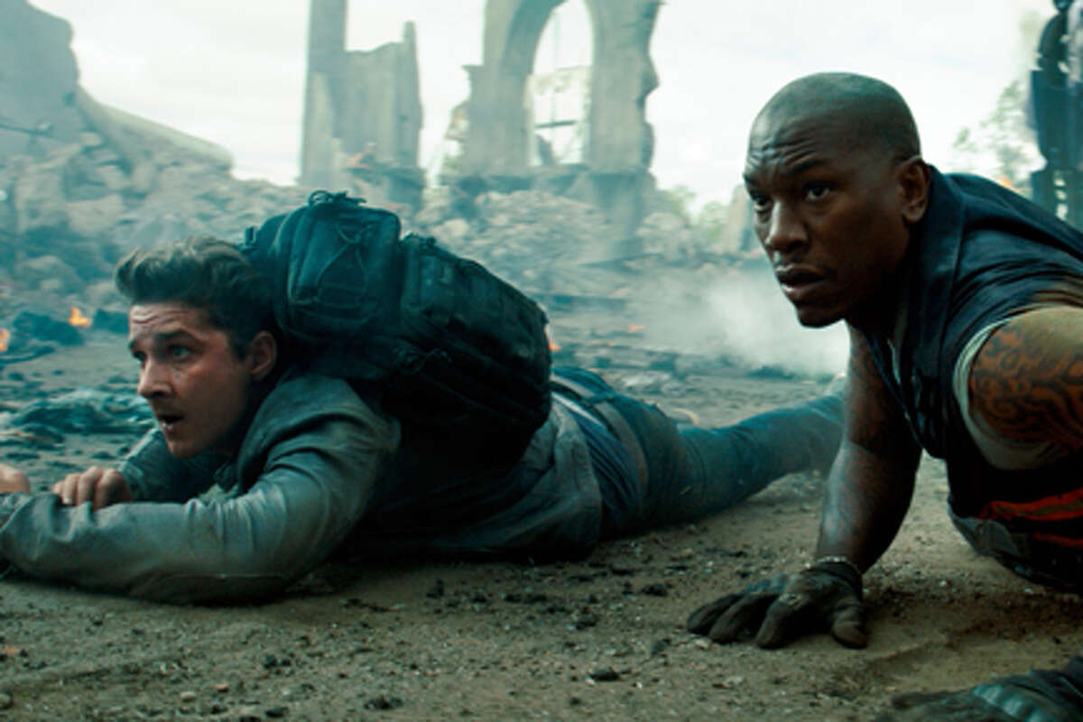 (L-R) Shia LaBeouf as Sam Witwicky and Tyrese Gibson as Robert Epps in "Transformers: Dark of the Moon."