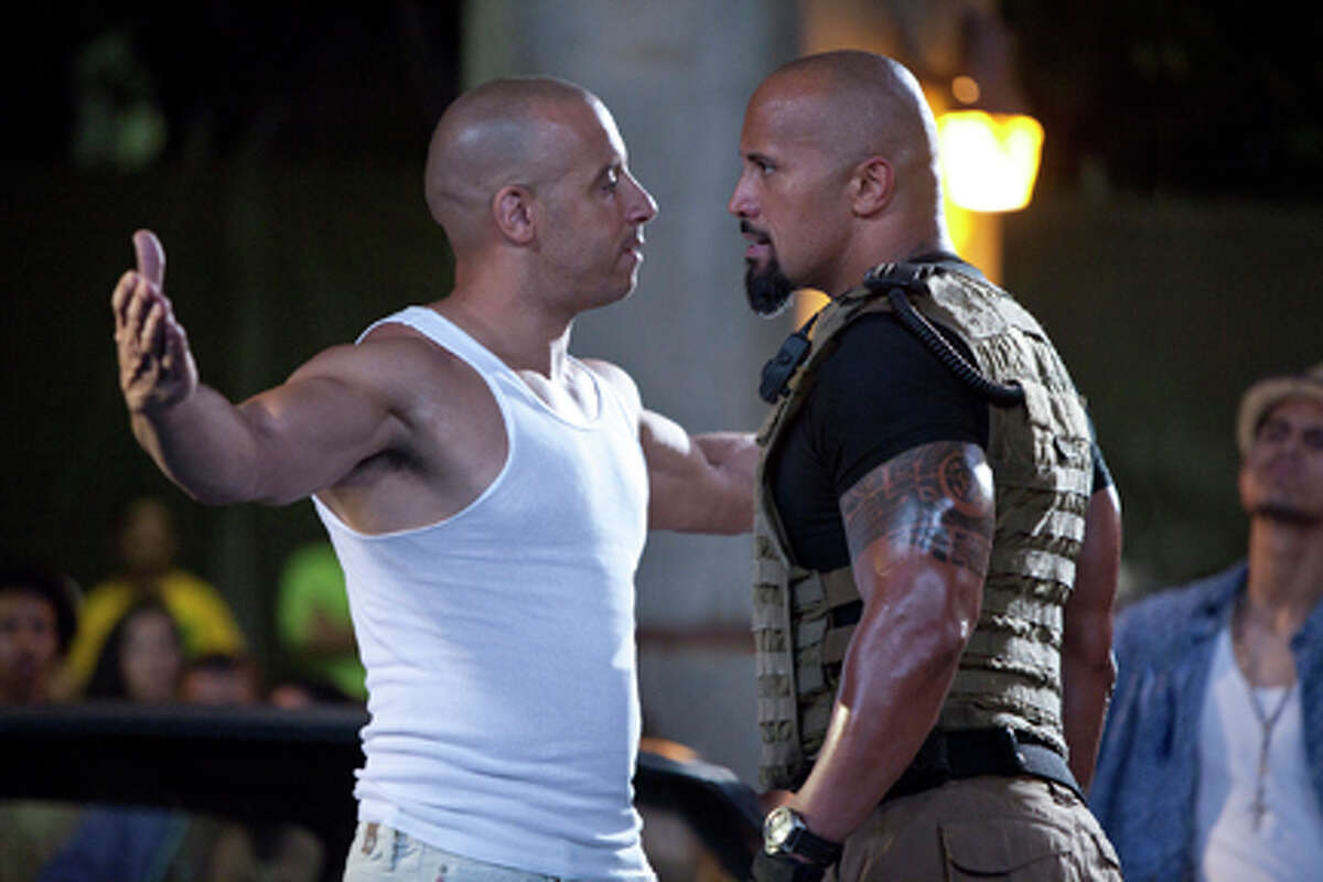(L-R) Vin Diesel as Dominic Toretto and Dwayne Johnson as Hobbs in "Fast Five."