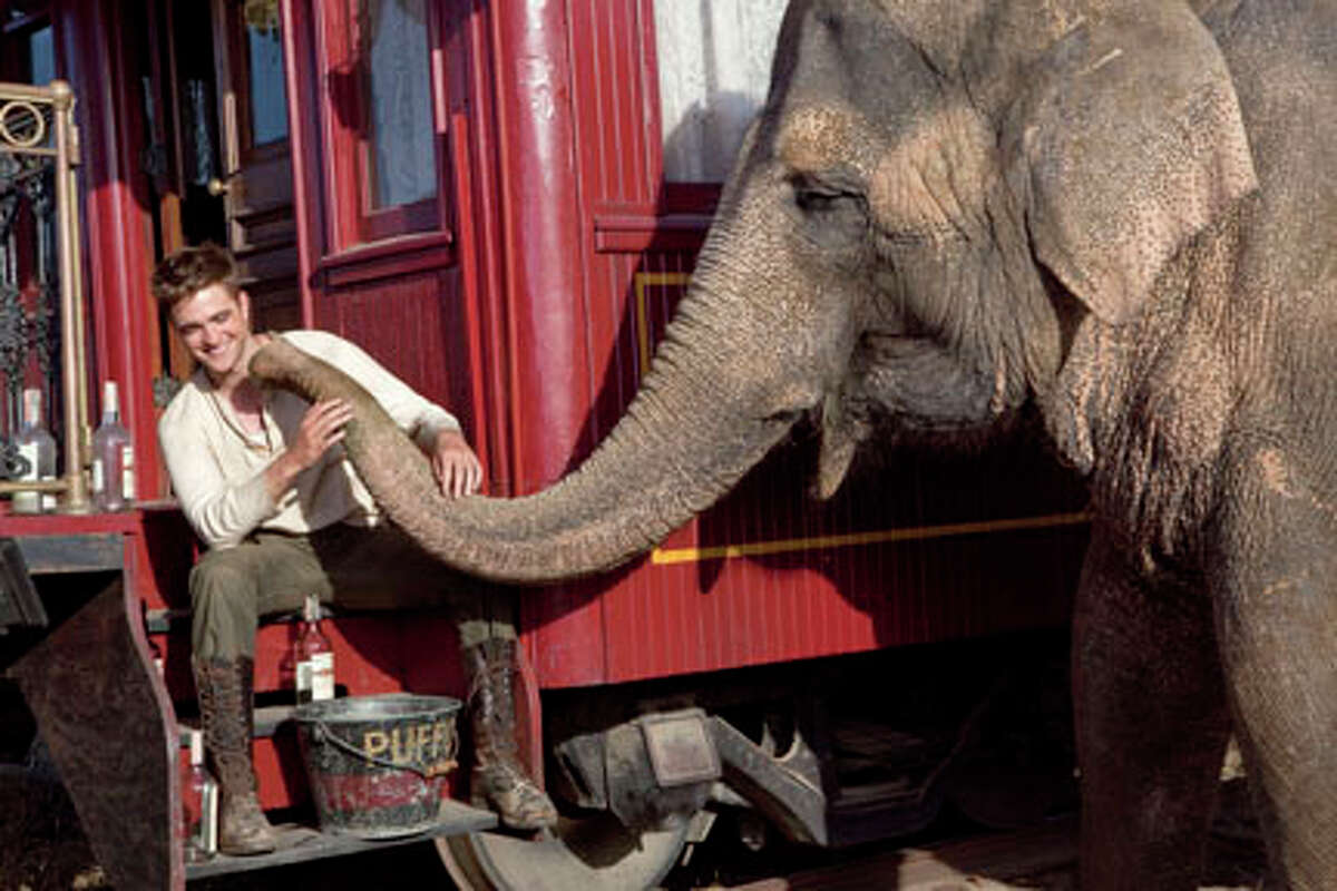 Robert Pattinson as Jacob and Rosie the elephant in "Water for Elephants."