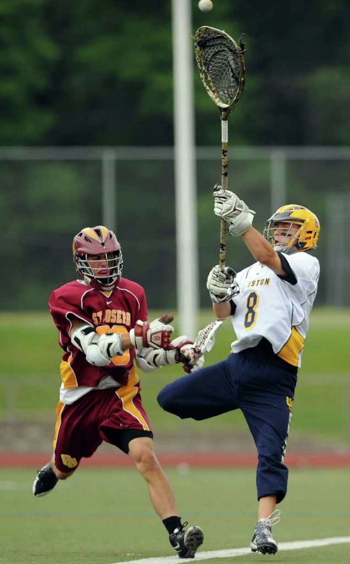 Weston goalie Alex Peyreigne makes a save in the 2010 Class S championship game against St. Joseph. The Trojans won the Class S title on June 12, 2010 with a 7-6 victory over St. Joseph.