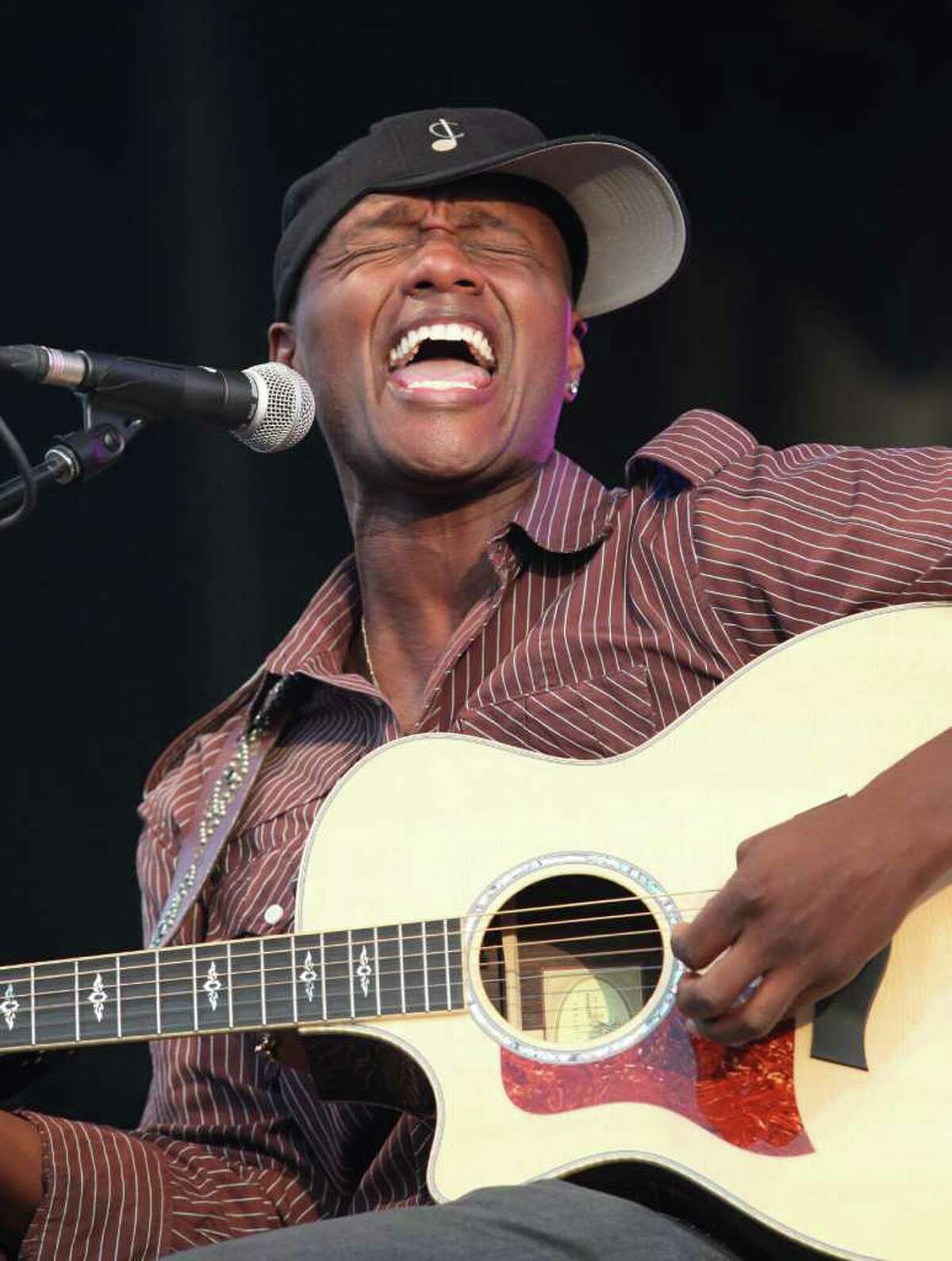 Javier Colon, winner of the NBC reality talent show "The Voice," performs at the Cisco Ottawa Bluesfest on Tuesday, July 5, 2011. Colon will appear before fans at a homecoming celebration at his alma mater, Bunnell High School in Stratford, Conn. on Sunday July 10. (The Canadian Press Images PHOTO/Ottawa Bluesfest/Patrick Doyle via AP Images)